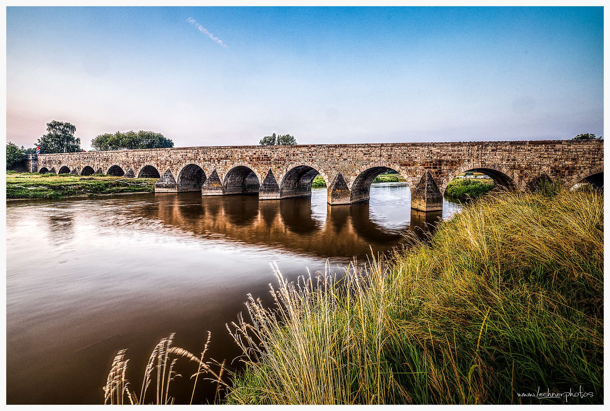 Old masonry bridge of Pontabault